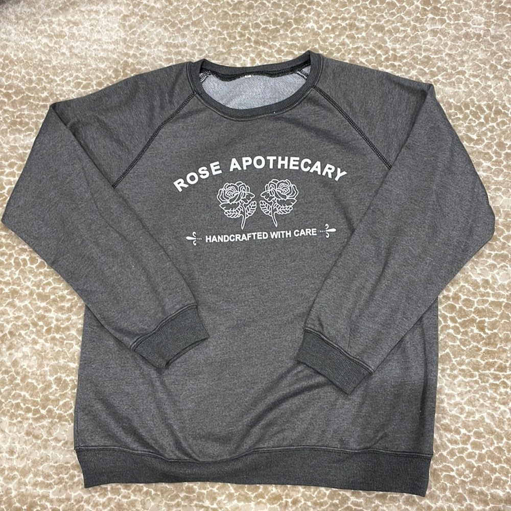 ‘Schitt’s Creek’ Rose Apothecary sweatshirt